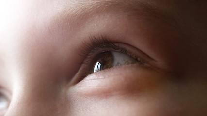 The child's eye is very close