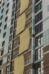 Futuristic building with windows in neon colors