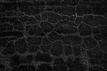 asphalt in cracks texture / abstract background cracks on asphalt road
