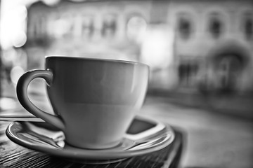 cup in an outdoor cafe / breakfast concept in a cafe, coffee, tea, morning drink