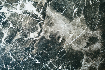 Natural dark marble abstract background or backdrop.