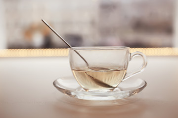 English tea in a cafe / cup and kettle with five o'clock tea