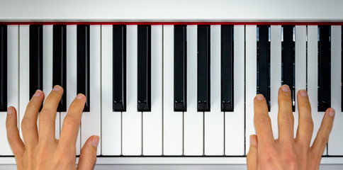 close-up of piano keys. close frontal view, black and white piano keys, viewed from side, musician hands playing piano, concept for live music festival. classical music, Instrument on stage