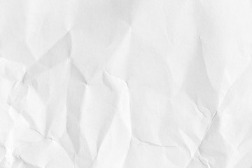White crumpled paper background, texture old for web design screensavers. Template for various purposes or creating packaging.