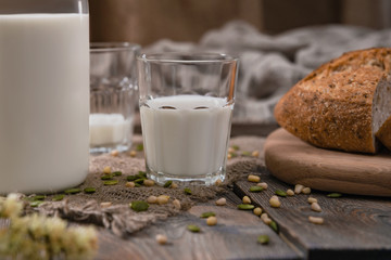 Rustic breakfast with milk and bread on World Milk Day, first of June. Horizontal shot.