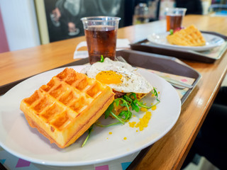 Waffles with egg and bacon