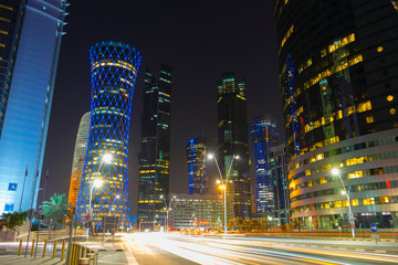 Fototapeta na wymiar Night urban skyline of modern skyscrapers in Financial District in Doha, Qatar
