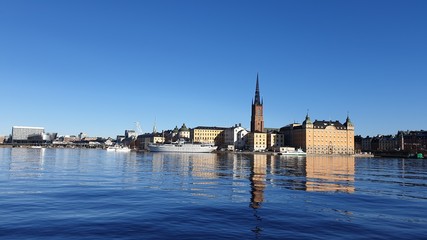 Sea bay on the background of the city and blue sky. Spring. Stockholm. Sweden.