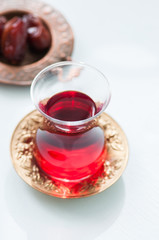 Glass of red turkish tea. Close up.