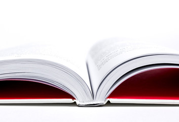 A white paper is opened on the table.