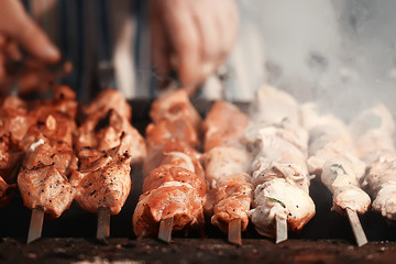 meat on charcoal shish kebab grill smoke