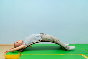 girl is lying on back on touch integration Board