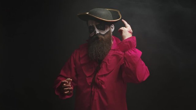 Young man with a stylish hat disguised as a pirate
