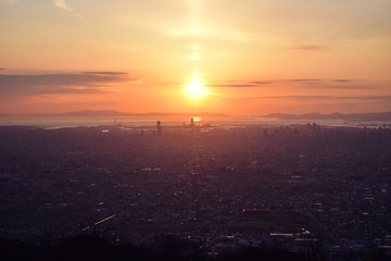 Obraz premium sunset over the sea with city view