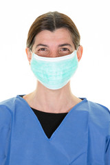 woman doctor protective mask on face surgeon gazing in hospital Coronavirus disease COVID-19