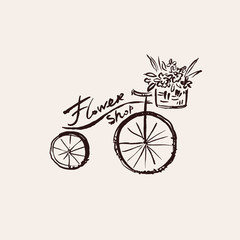 Bicycle with a basket of flowers.