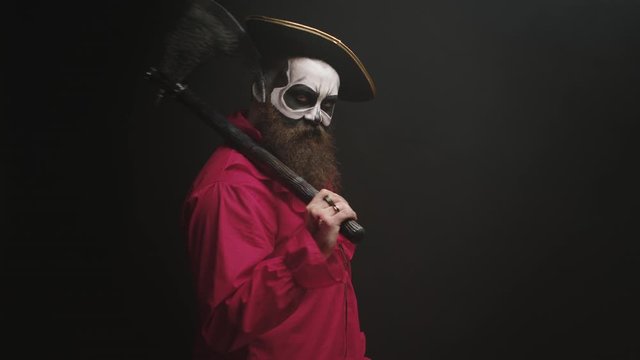 Crazy man with make up dressed up like pirate