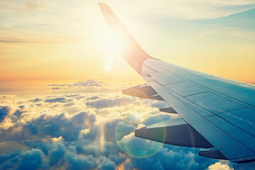 flying and traveling, view from airplane on sunset time 