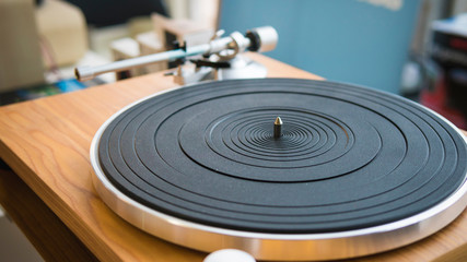 Close-up of modern turntable vinyl record player. Needle of a vinyl record