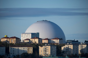 Naklejka premium Arena houses the Globe and hockey arena Tele 2 in the districts Hammarbyhöjden and Johanneshov in Stockholm in a blue light morning