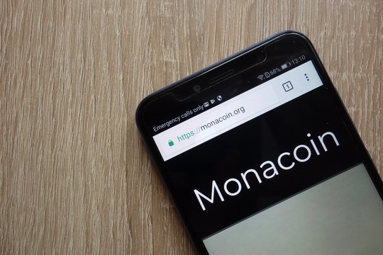 KONSKIE, POLAND - JULY 01, 2018: MonaCoin (MONA) cryptocurrency website displayed on Huawei Y6 2018 smartphone