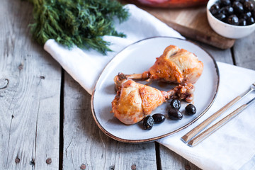 Chicken Cacciatore braised with wine, olives and tomatoes, traditional Italian dish.