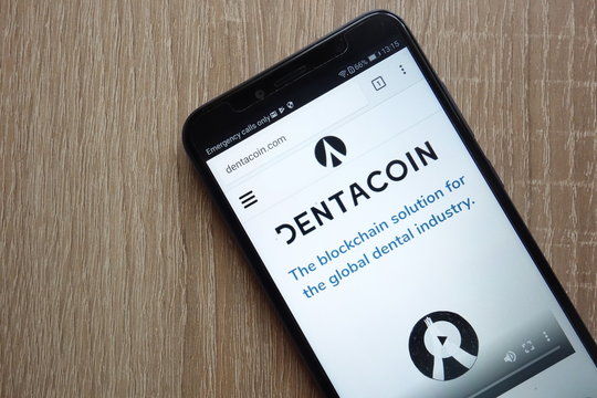 KONSKIE, POLAND - JULY 01, 2018: Dentacoin (DCN) cryptocurrency website displayed on Huawei Y6 2018 smartphone