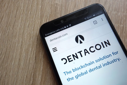KONSKIE, POLAND - JULY 01, 2018: Dentacoin (DCN) cryptocurrency website displayed on Huawei Y6 2018 smartphone