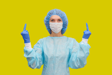 The doctor shows fuck sign on a yellow background. No coronavirus.