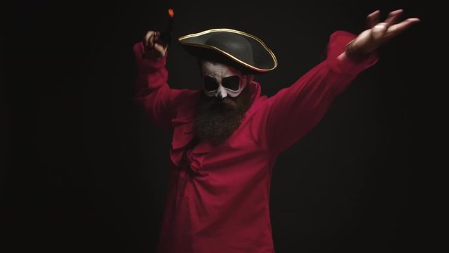 Man with beard dressed up like a drunk pirate