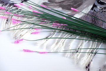 Beautiful sprig of flowers on the fabric. Plant.