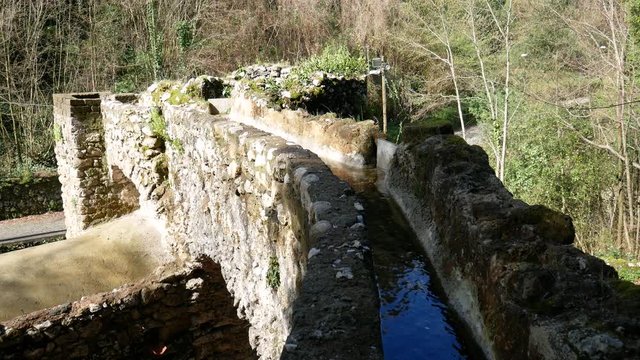 Ruins of water mill. The Valle dei Mulini (Valley of Mills) of Gragnano, Naples, Campania, Italy