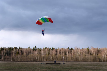 A parachute is flying in the sky.