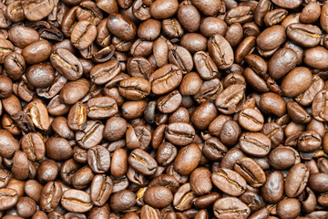 Coffee beans roasted dark brown seeds background texture