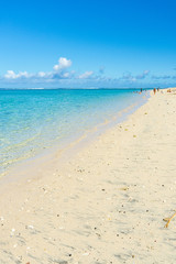 Fototapeta na wymiar Vacances sur la plage de la réunion, soleil et sable blanc