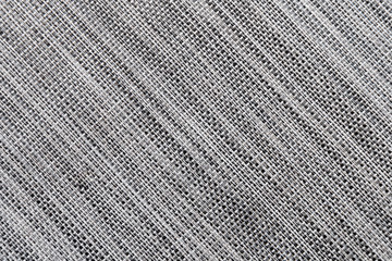 Mottled grey synthetic fabric woven in different tones of grey