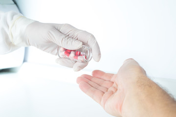 Medication dosing in hospital The doctor administers drug to the patient