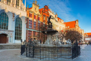 Fountain of Neptune in old town in Gdansk, symbol of the city. Poland