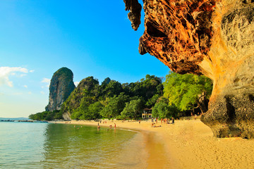 The tropical beach with blue sky, clear water, yellow rock, Krabi, Thailand