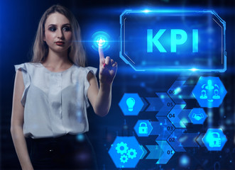 Business, Technology, Internet and network concept. Young businessman working on a virtual screen of the future and sees the inscription: KPI