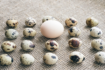 Obraz premium Easter eggs pattern on a rough canvas background. Happy easter banner