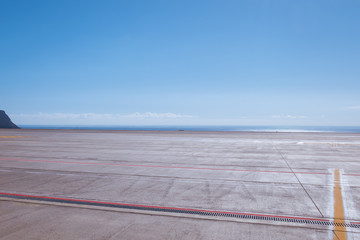 Tenerife South airport runway by the ocean