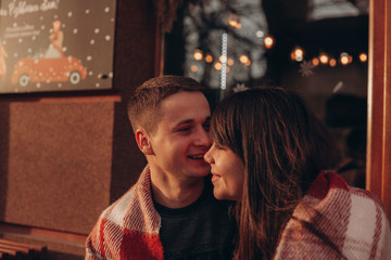 young couple on a date in a cafe