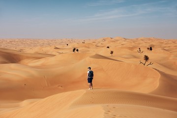 Man in the middle of desert