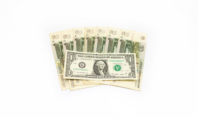 A lot of Russian rubles and dollars on a white isolated background. The problem of the ruble...