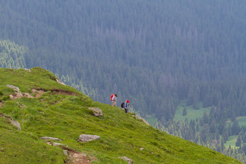 Tourists descend from the top of the mountain, Carpathians