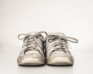 Dirty white running shoes