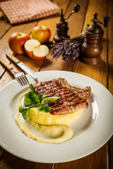 Pork chop with apple pure and potato mash
