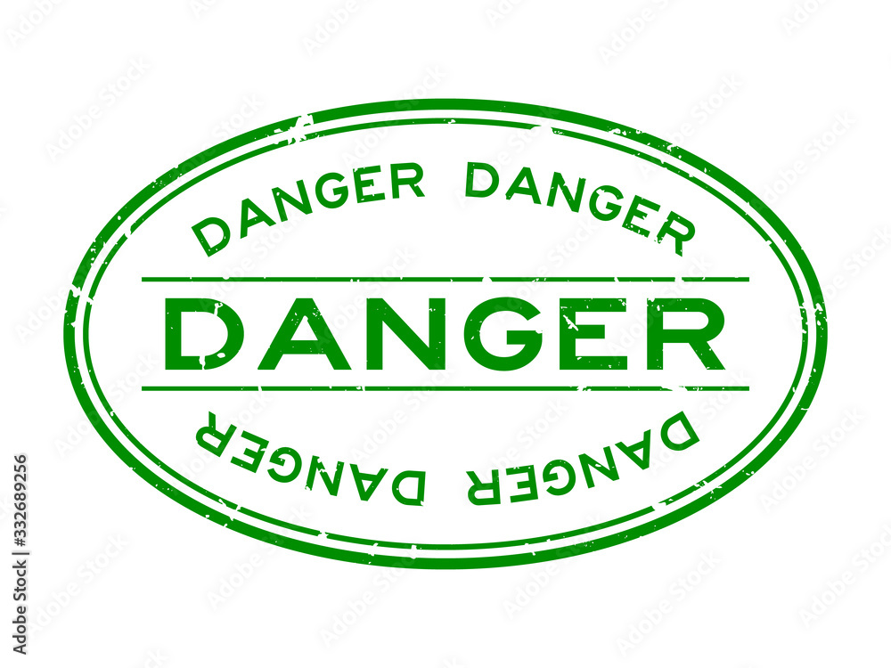 Sticker Grunge green danger word oval rubber seal stamp on white background