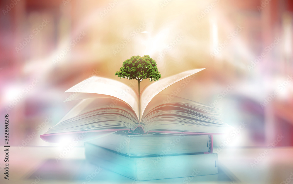 Poster imagine a picture book of an ancient book opened on a wooden table with a sparkling golden backgroun